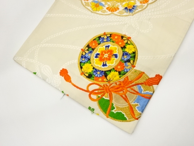  華文に花葉・鼓模様織出し袋帯